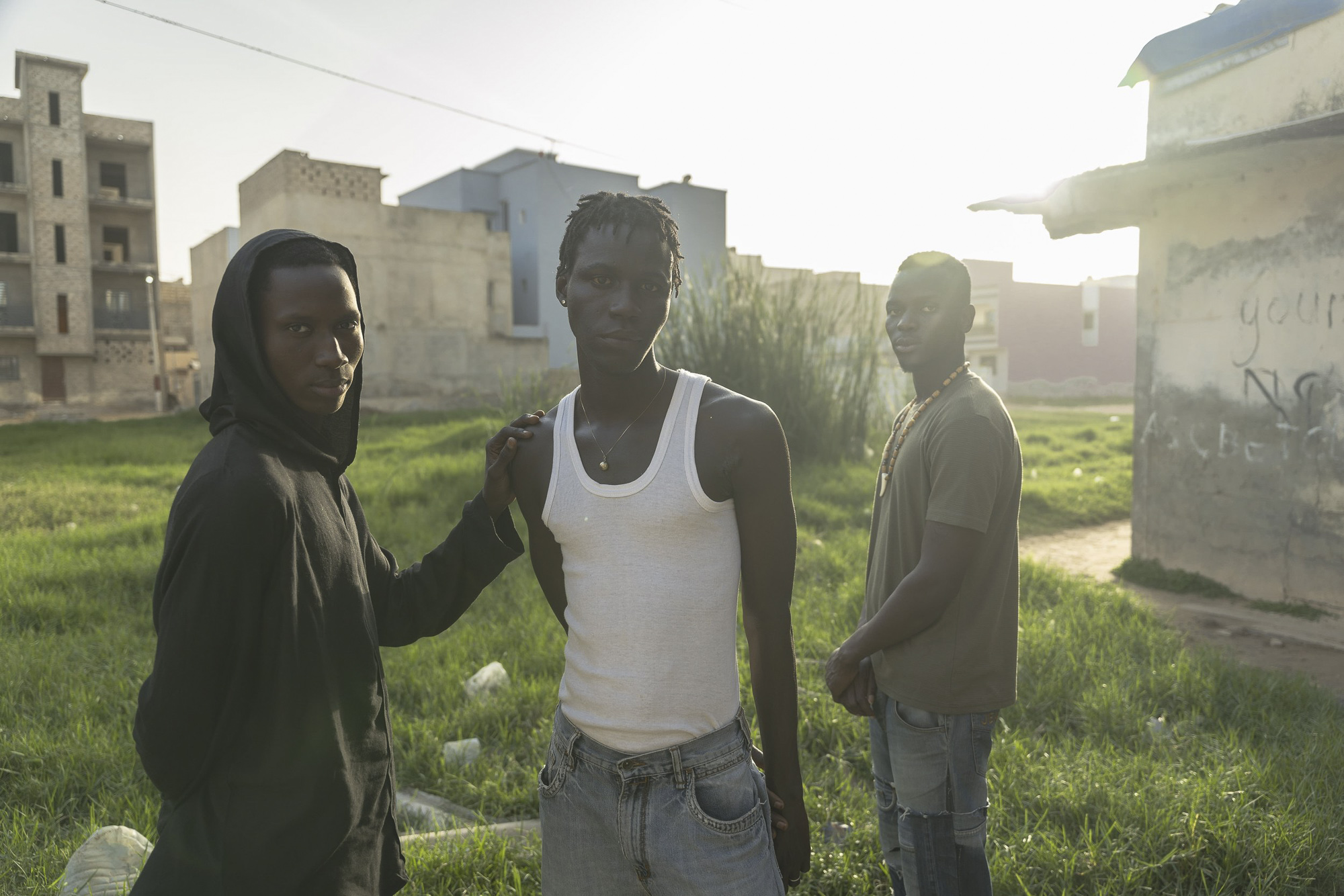 Willy Diatta, Mouha Sow et Sam Diatta, à Keur Mbaye Fall. Dakar, 8 décembre 2024.