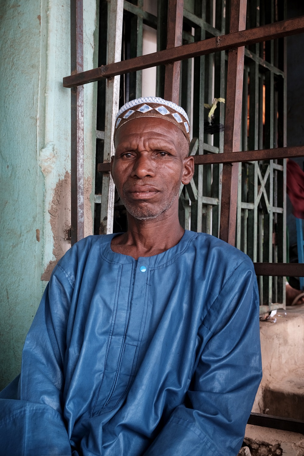 Gadha Diallo, demandeur d'asile originaire de Diébougou, au Burkina Faso. Région du Bounkani, Côte d'Ivoire, 2025.