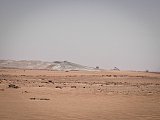 Huge piles of radioactive sludge from the leaching process are piled up in the open air inside the Somaïr mine.